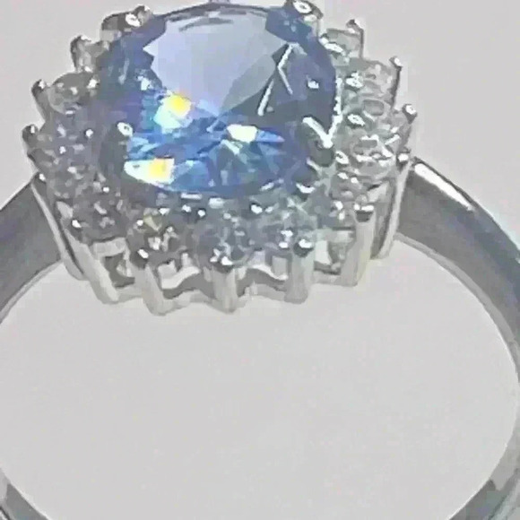 STERLING SILVER BLUE TOPAZ & SIMULATED STONES SET AROUND CENTER. - Picture 3 of 4